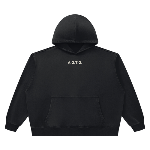 All Glory to God heavyweight hoodie in vintage wash black, front with A.G.T.G. on the chest